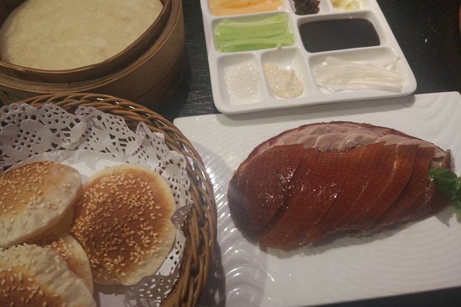 Beijing Evening Tour: Chaoyang Acrobatic Show with Peking Duck Dinner - Hotel pickup makes the evening simple