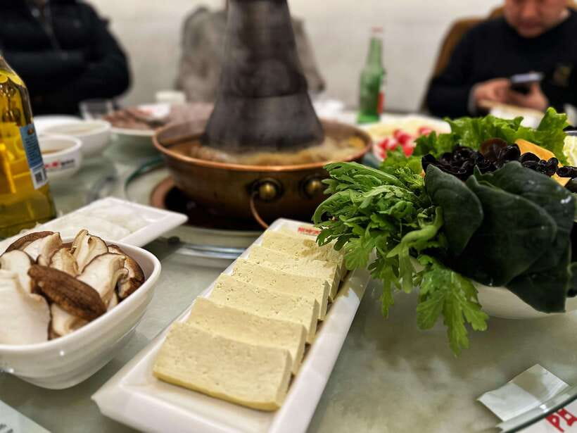 Beijing Hutong Food Crawl Delights: Peking duck, Hotpot&More - Peking duck with a front-row carving show