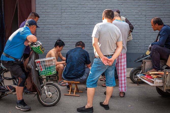 Beijing Hutong Walking Food and Beer Tour at Hidden Restaurants - Stop four: grilled meat, beef buns, and Beijing wraps