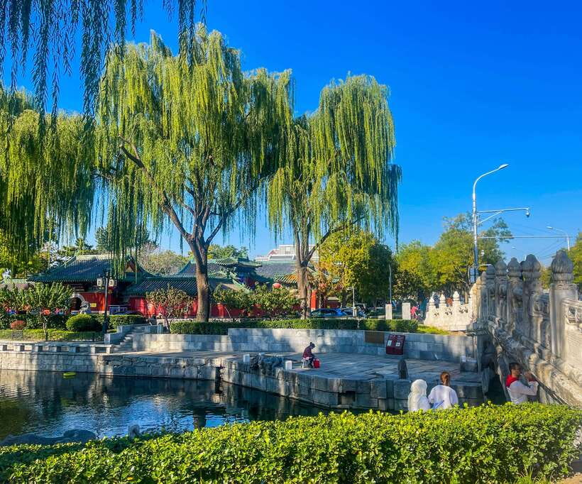 Beijing: Hutongs & Drum Tower City Walking Tour - Reaching the Drum and Bell Tower square