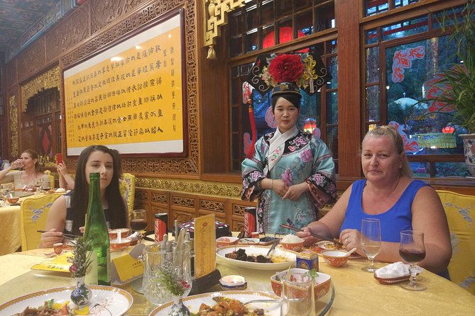 Beijing Imperial Dining Experience at Bai Jia Da Yuan Restaurant with Houhai Lake Bar Tour - From palace grounds to Beijing’s Olympic lights