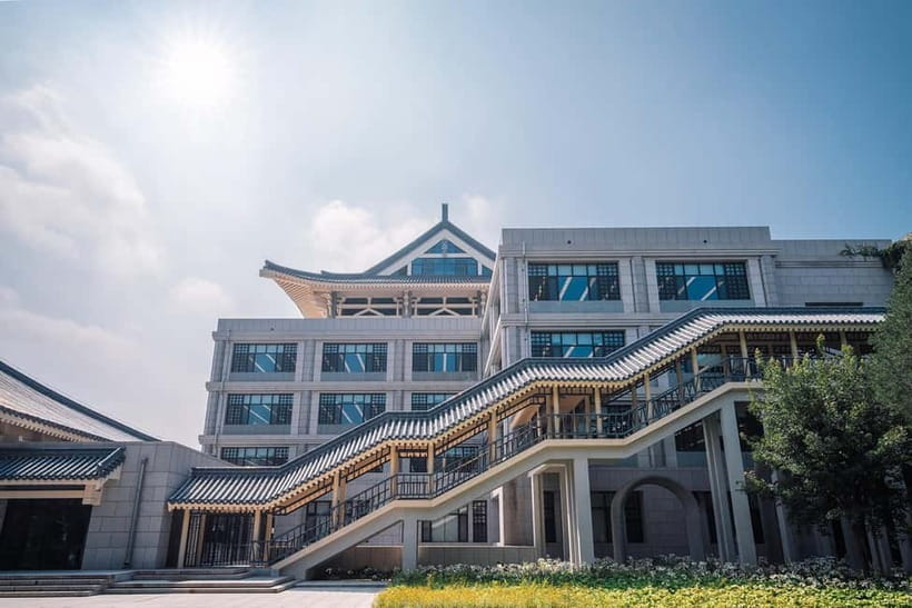 Beijing: Peking University Campus Guided Walking Tour - Peking University Library and the statue of Cai Yuanpei
