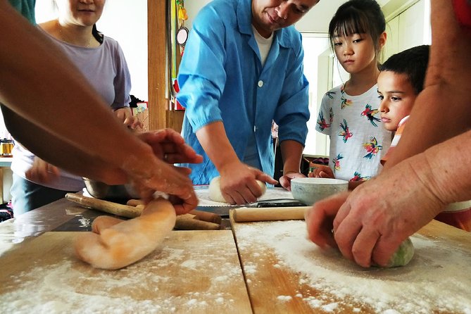 Beijing: Private Dumpling Cooking Class in Local Family - Sitting down to eat what you prepared