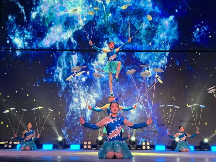 Beijing: Qinle Palace Acrobatics Show Ticket - Giant wheels and the globe motorcycle act