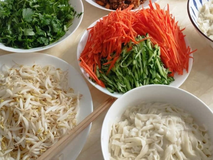 Beijing: Vegan Home Cooking & Local Market Tour with Sanxia - Tea, dim sum, and a proper shared meal