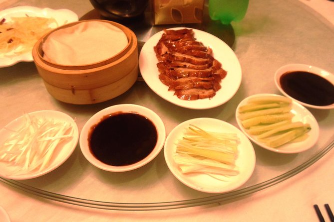 Private Tour to Pearl Market Acrobatic Show & Peking Duck Dinner - Peking duck: a meal with a small but important clarification