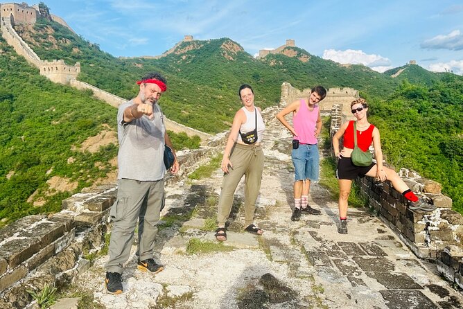 Private Trekking Day Tour to Jinshanling Great Wall - Restored brickwork beside wild Wall