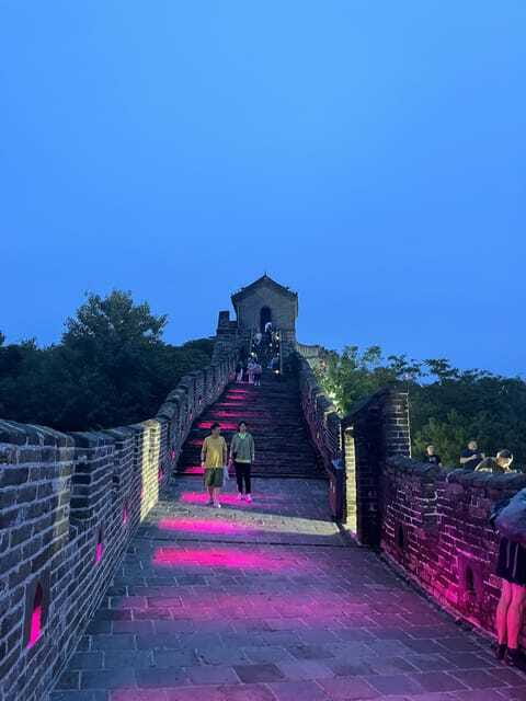 Twilight Glow at Mutianyu Great Wall Evening Bus Tour+Ticket - Sunset views, lit watchtowers, and evening music