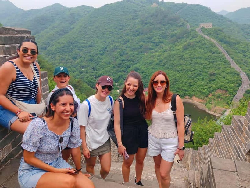 Water-Great Wall Odyssey: Hike & Cruise One Day Tour - A boat arrival that changes the view